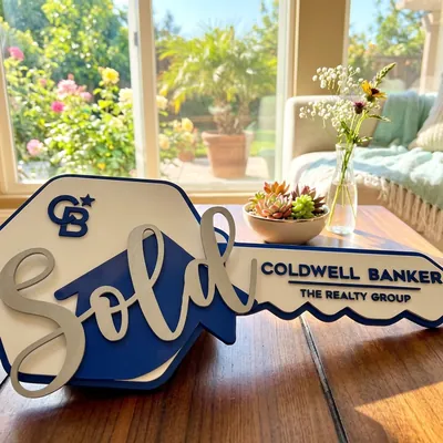 Coldwell Banker The Realty Group Janesville logo