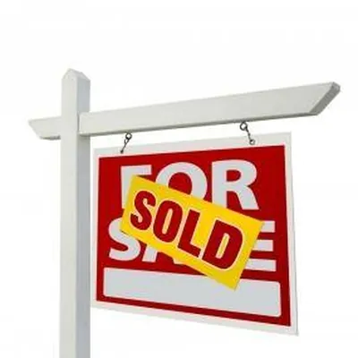 Critique Real Estate & Management logo
