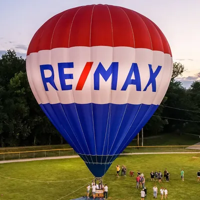 Excelsior Springs REMAX Area Real Estate logo