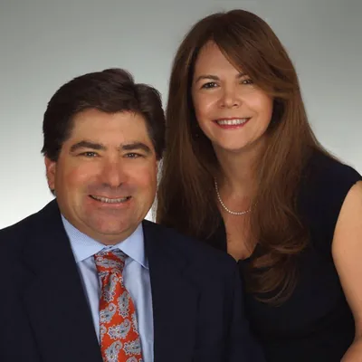Gus & Khristine Brugger logo