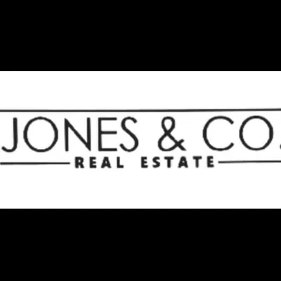 JONES & CO. Real Estate logo