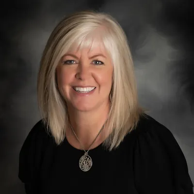 Julie Moore/ Vision Homes Group logo