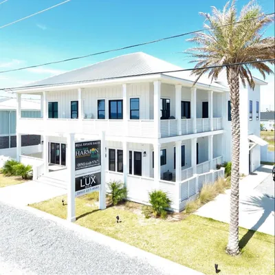 Mexico Beach Harmon Realty logo