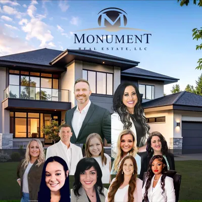 Monument Real Estate logo