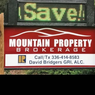 Mountain Property Brokerage Accredited Land Consultants logo