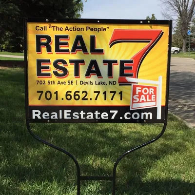 Real Estate "7" Devils Lake logo
