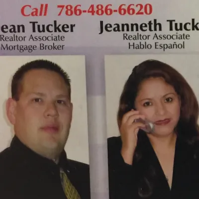 Real estate by the Tucker Team logo
