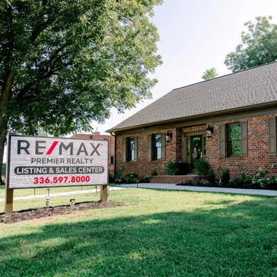 REMAX Premier Realty logo