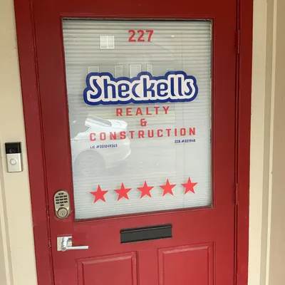 Sheckells Realty logo