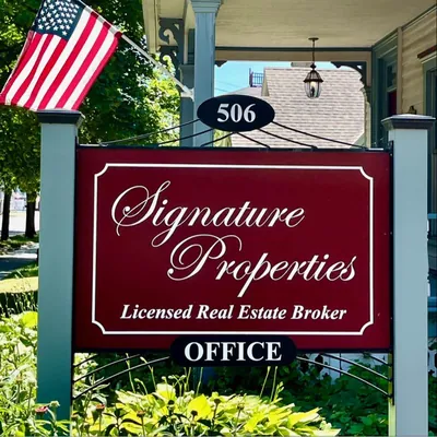 Signature Properties logo