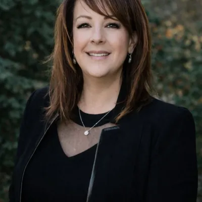 Suzette & Associates Real Estate Broker logo