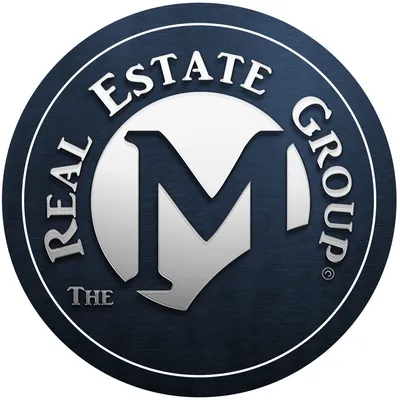 The M Real Estate Group logo