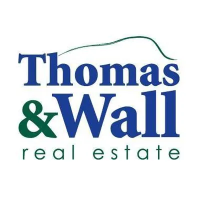 Thomas & Wall Real Estate logo