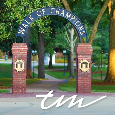 TM Realtors logo