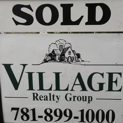 Village Realty Group logo