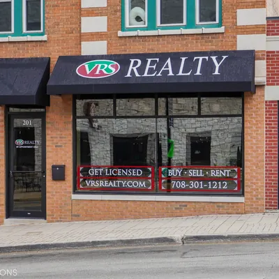 Village Realty logo