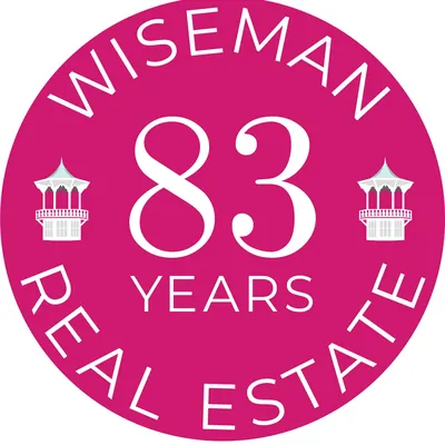 Wiseman Real Estate logo